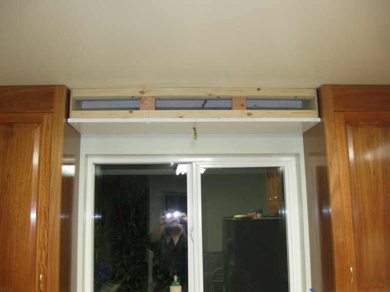 Soffit under board with braces